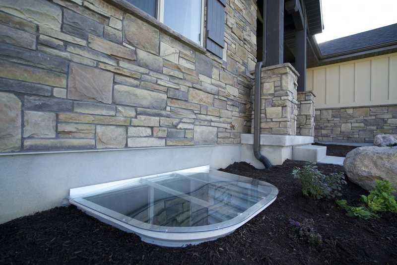 Poly window well cover with house