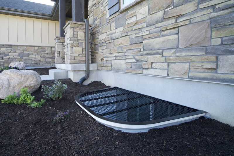 Steel window well cover with house